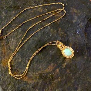 Real opal stone and 14 karat golden necklace
